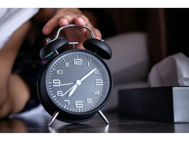 alarm clock 5 am waking up rich person not touching phone first